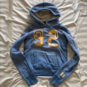 Abercrombie & Fitch distresses sweater in blue